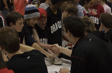 Matt Burston signing at Hawks game